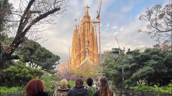Tourists gazing at Sagrada Família